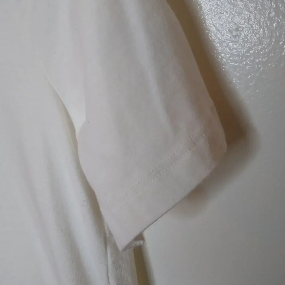 Zenana Outfitters women's size medium White T-shirt. Casual.